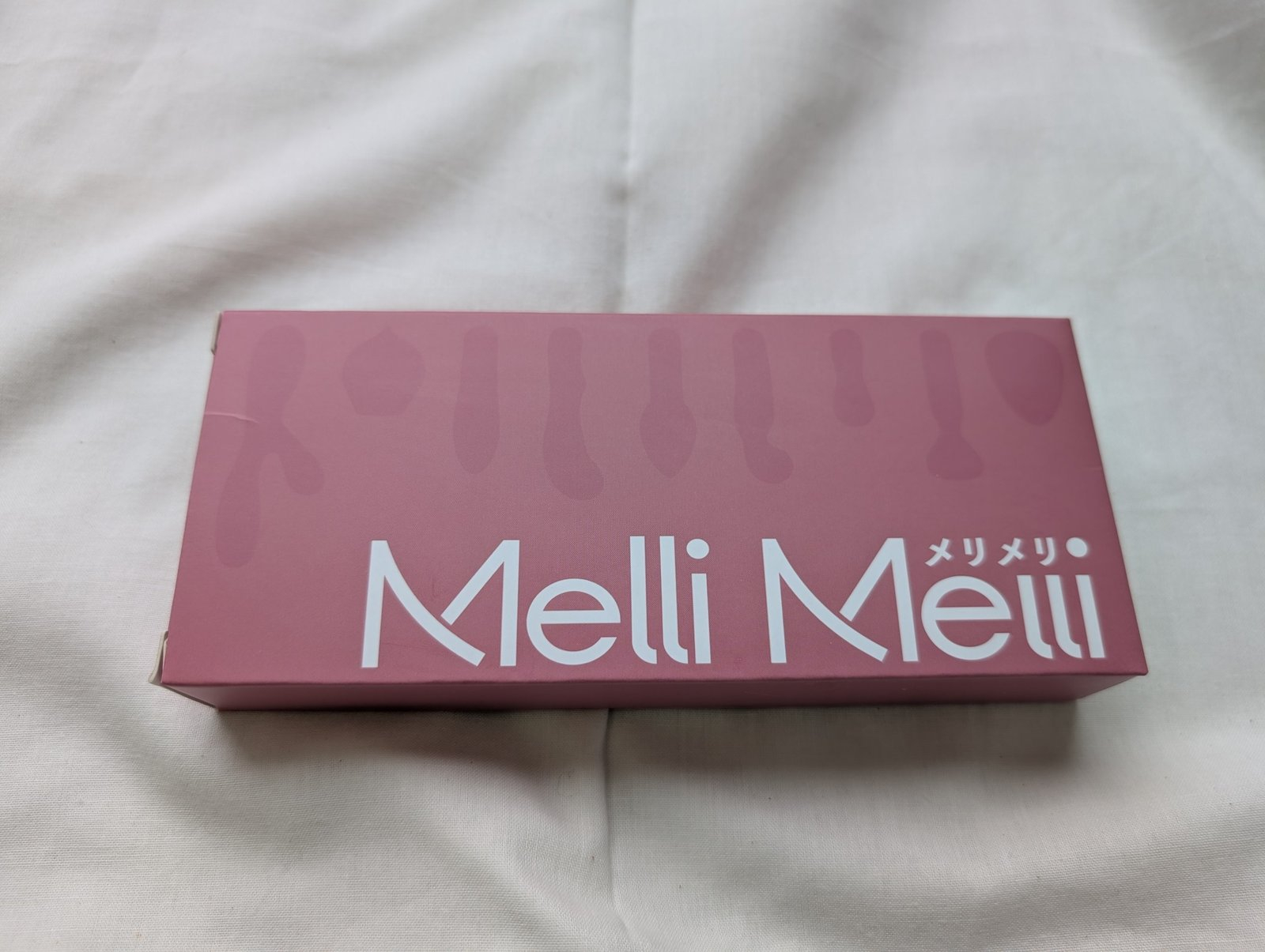 Melli Melli 4in1快感覚醒のパッケージ(スモーキーピンクの箱)
