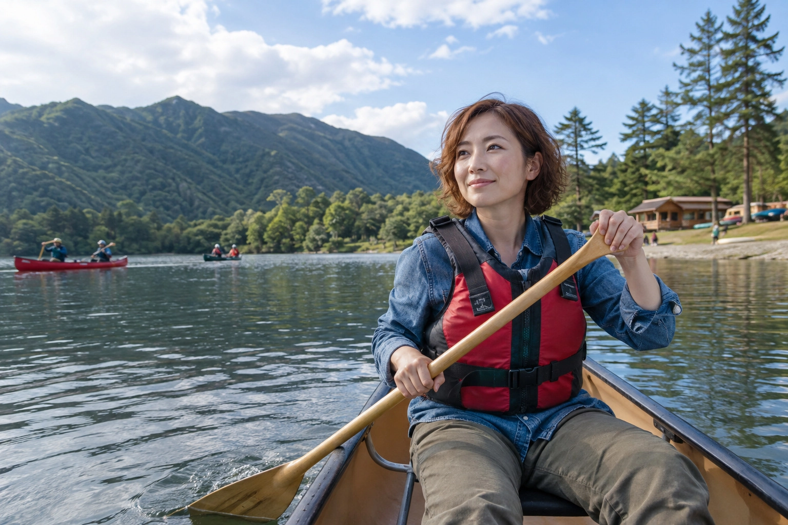 湖でカヌーに挑戦する大人の女性