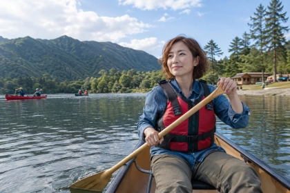 湖でカヌーに挑戦する大人の女性